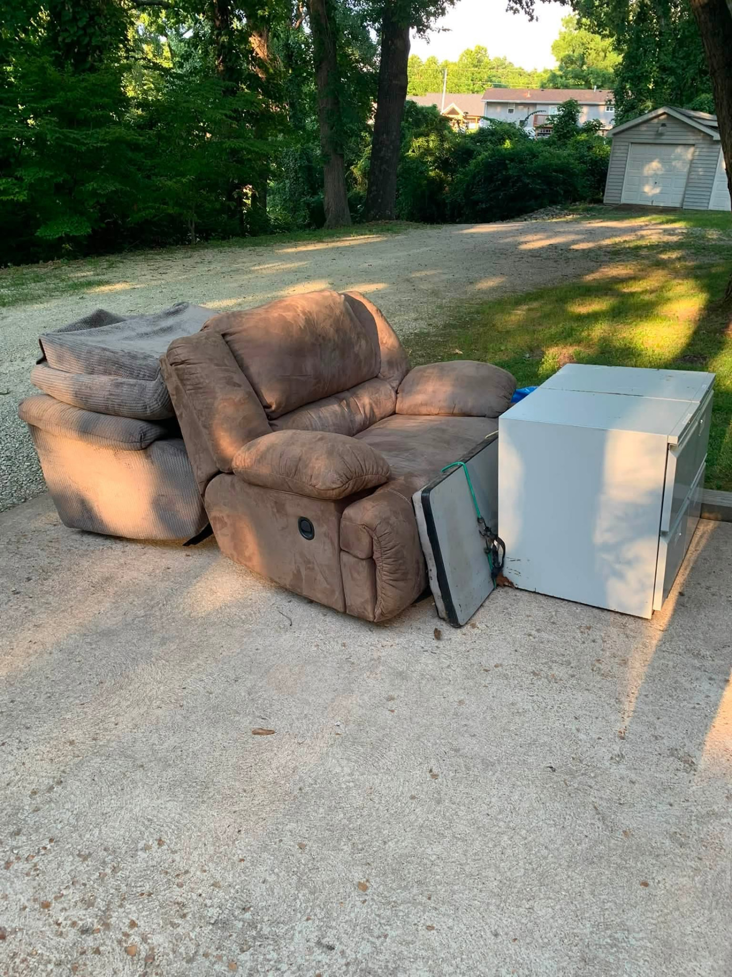 Recliner sofa and dresser set out for furniture removal